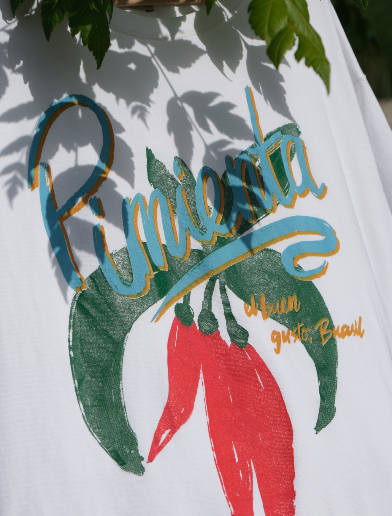 GRAPHIC SPICE TEE